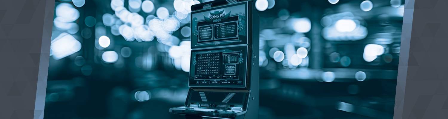 Slot machine game surrounded in lights.